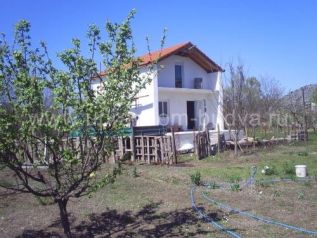 Объект-6757. Двухэтажный дом с большим участком и плодоносящим фруктовым садом в тихом пригороде Подгорицы.